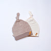 pack of 2 newborn hats with tie and buttons pink and beige