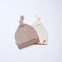 pack of 2 newborn hats with tie and buttons pink and beige