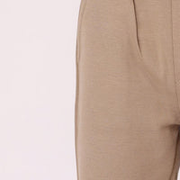 elastic band casual pants for boy with zipper and pocket beige color